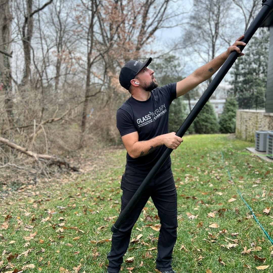 Dave Scribani of Glass Therapy working a water-fed pole