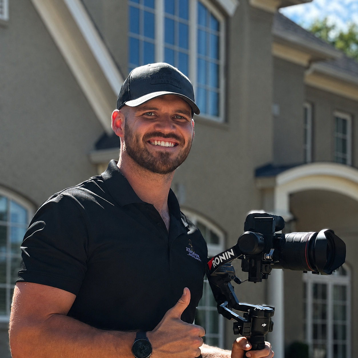 Trey Pruitt of Honey Rock Media holding a camera gimbal